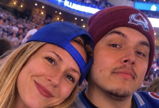 Brandon and a longtime friend at a hockey game